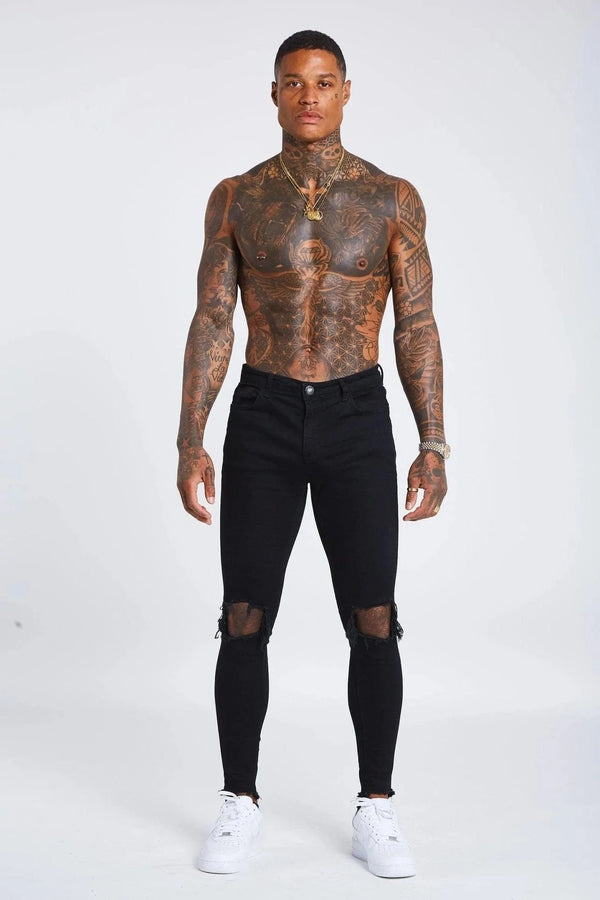 SKINNY FIT JEANS DESTROYED KNEE - BLACK