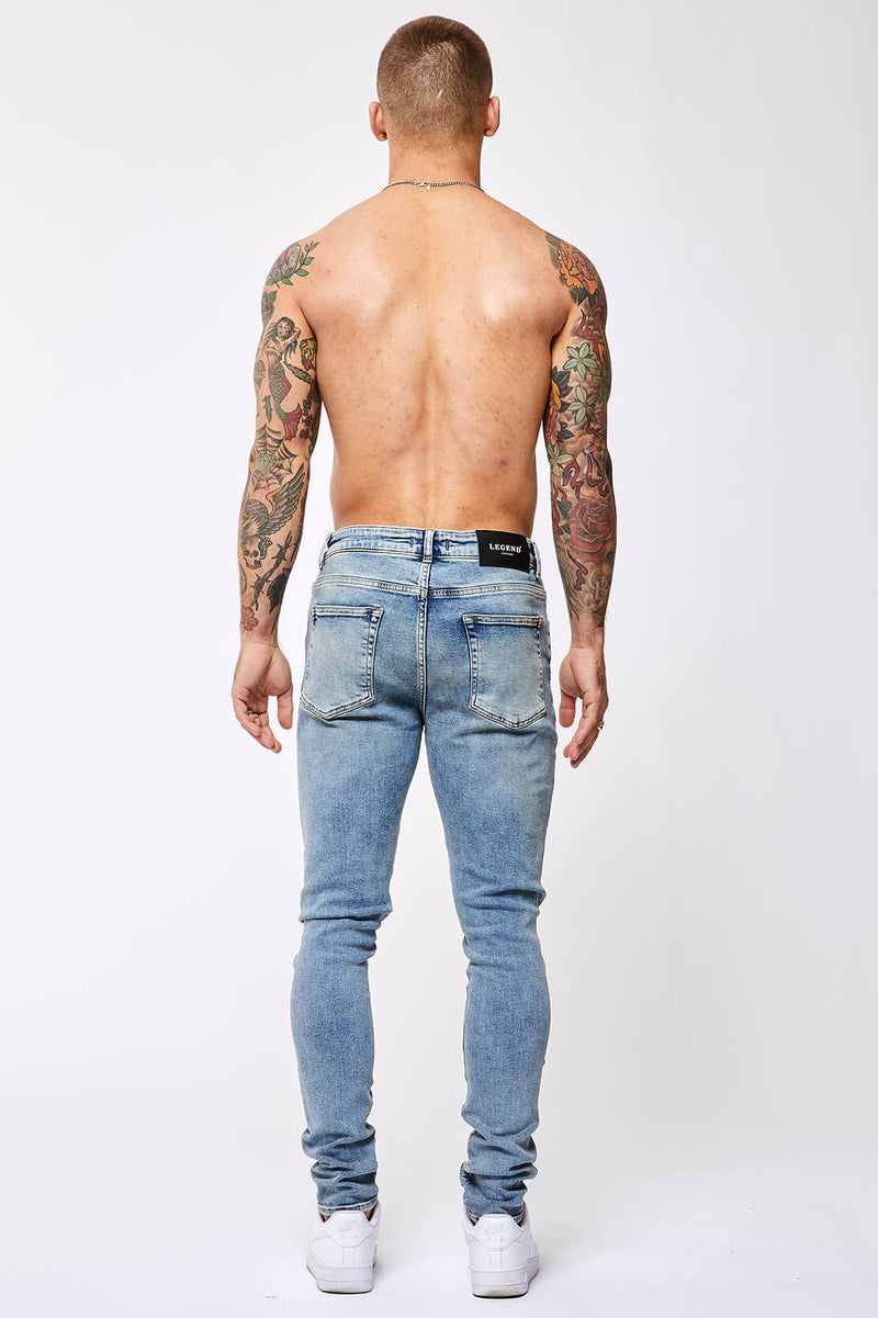 SKINNY FIT JEANS - VINTAGE BLUE RIPPED KNEE