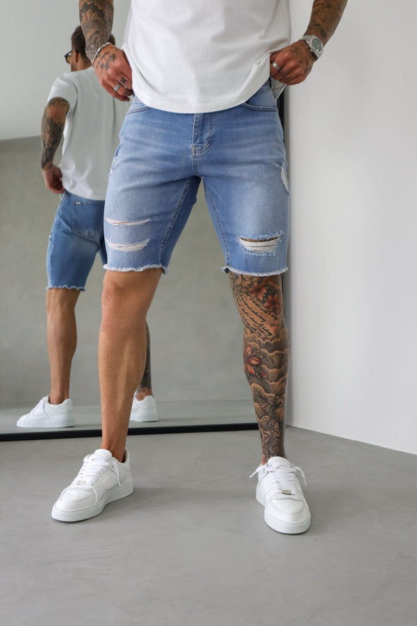 SLIM DENIM SHORT - LIGHT BLUE RIPPED