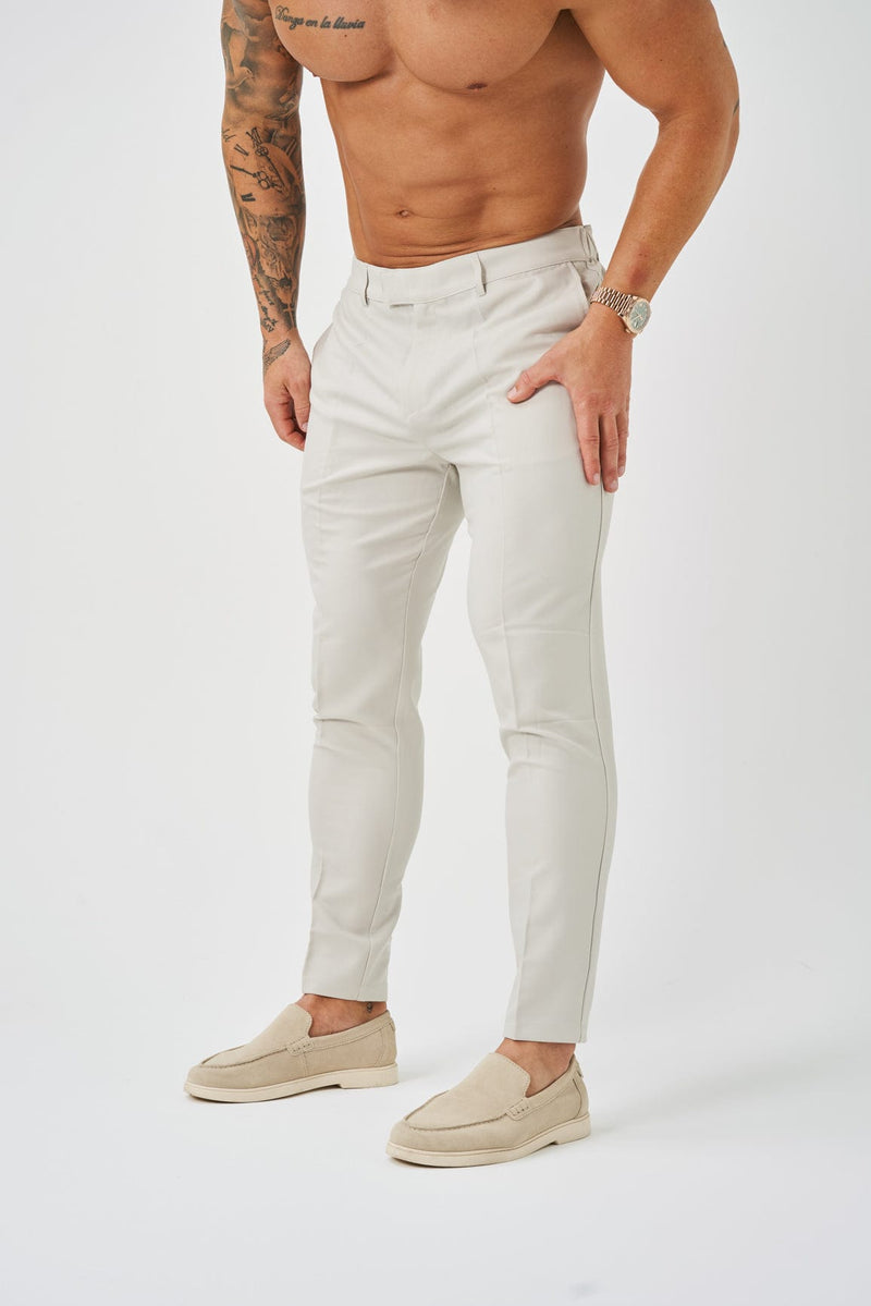 STRETCH WOVEN TROUSER - SAND