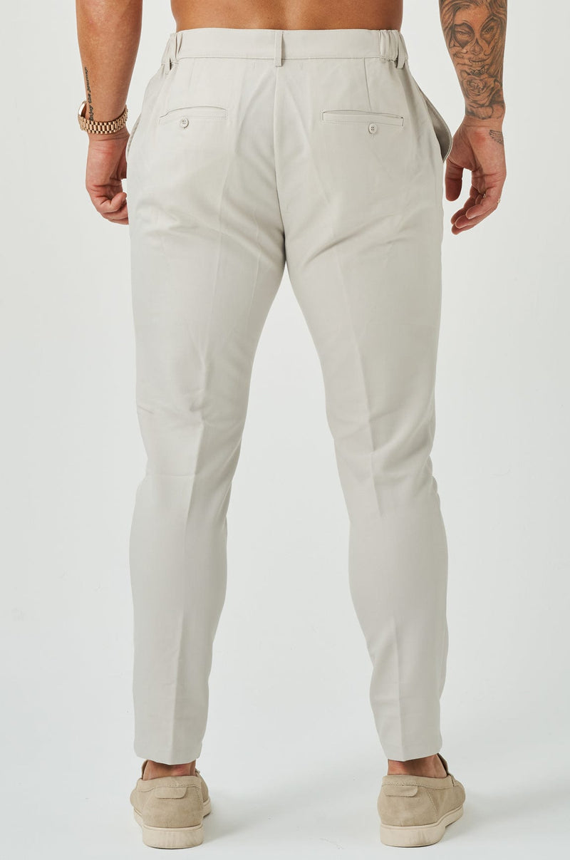 STRETCH WOVEN TROUSER - SAND